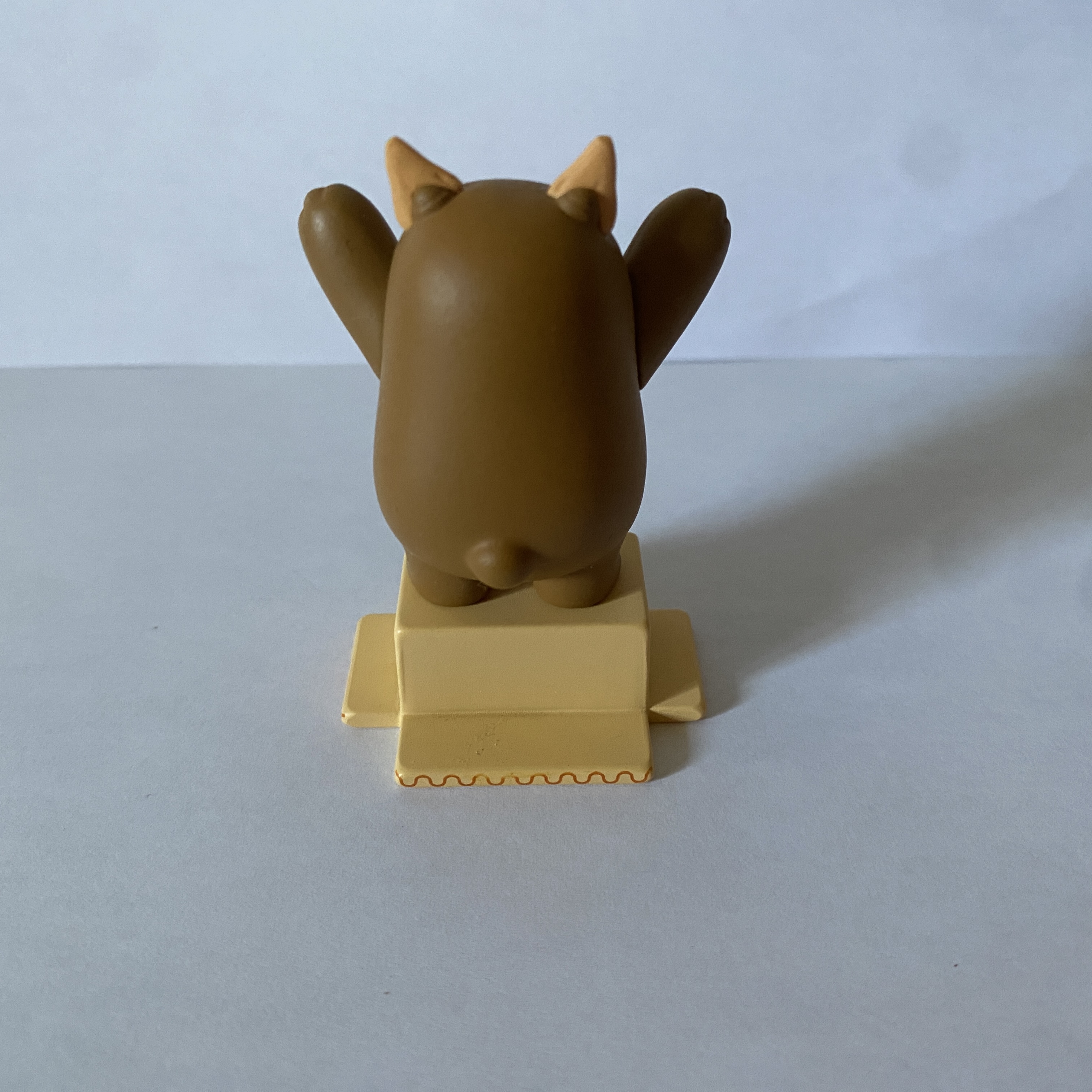 Image of a plastic bear figurine.