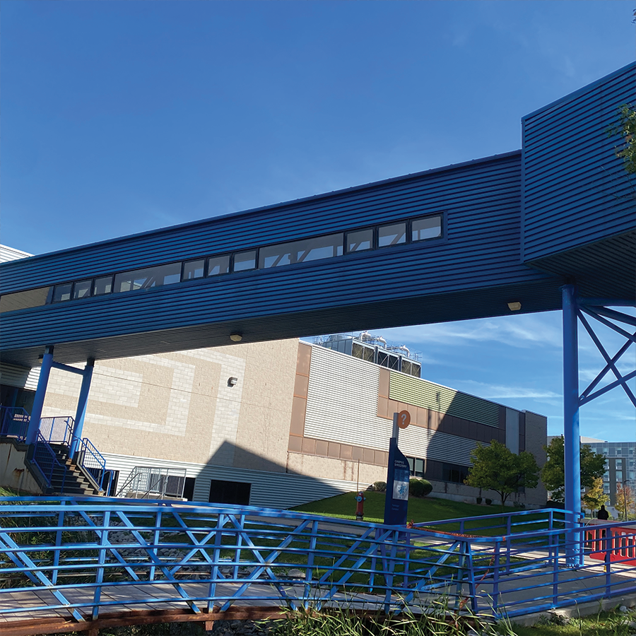 The exterior of the bridge that connects the E wing and G wing of Sheridan. The bridge is made primarily out of glass and steel.