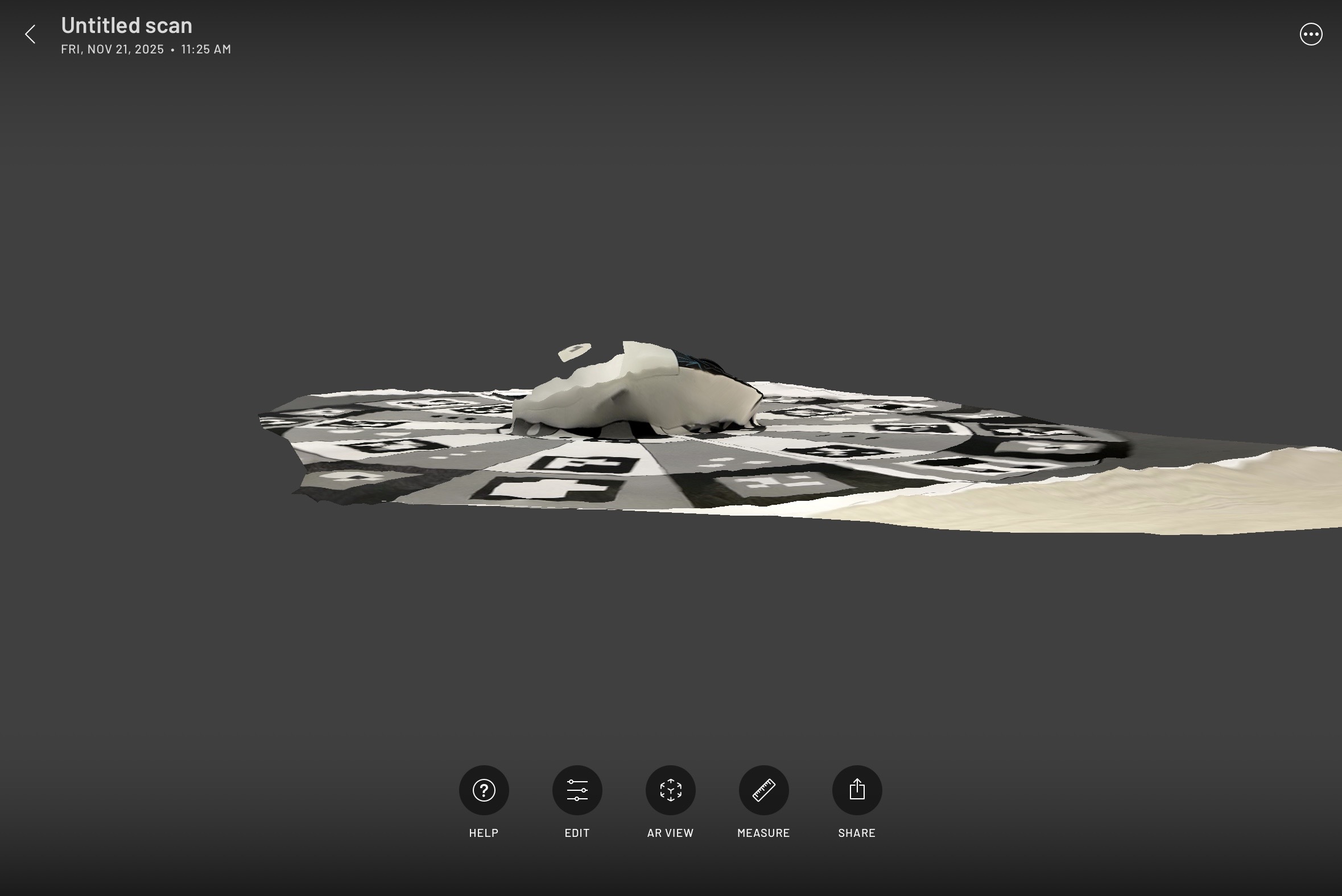 Another angle of the mouse scan. Only the logo got scanned properly, while the rest of the mouse has a lot of distortion and missing parts.